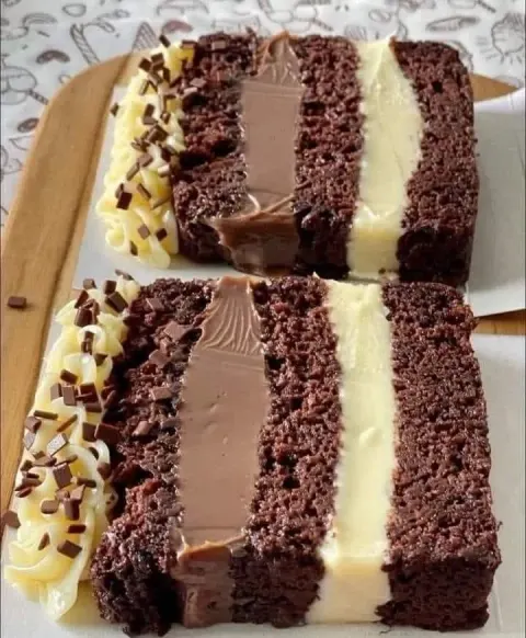Decadent Layered Chocolate Cake with Creamy Filling & Ganache Topping
