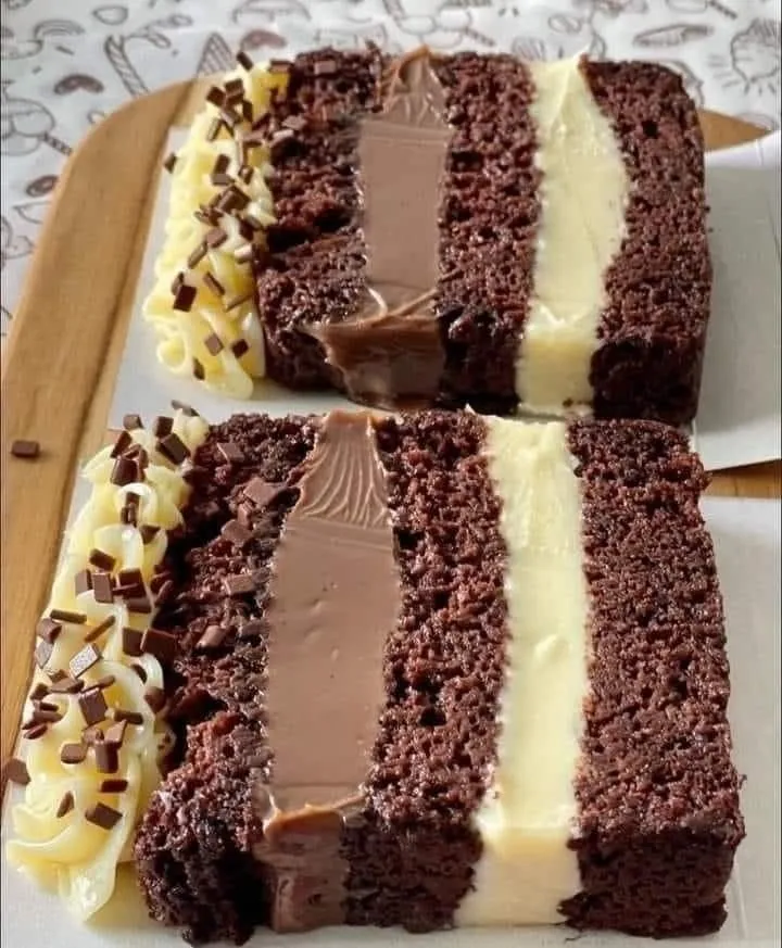 Decadent Layered Chocolate Cake with Creamy Filling & Ganache Topping