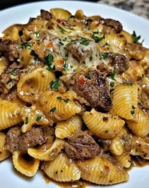 Garlic Butter Steak Bites & Creamy Parmesan Shells – Tender, Cozy, and Completely Irresistible