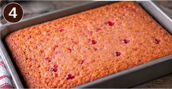 Baked maraschino cherry cake cooling in the pan