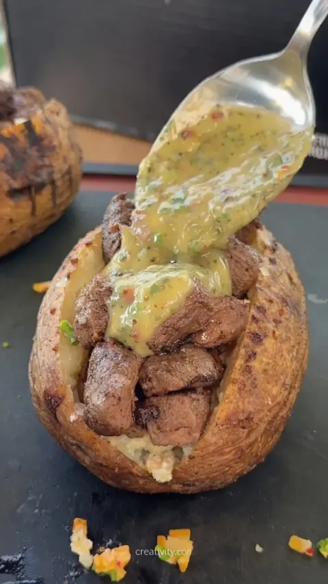 Grilled Steak Bite Loaded Baked Potatoes with Garlic Herb Butter – Steakhouse Comfort Food 🥩🥔🧄